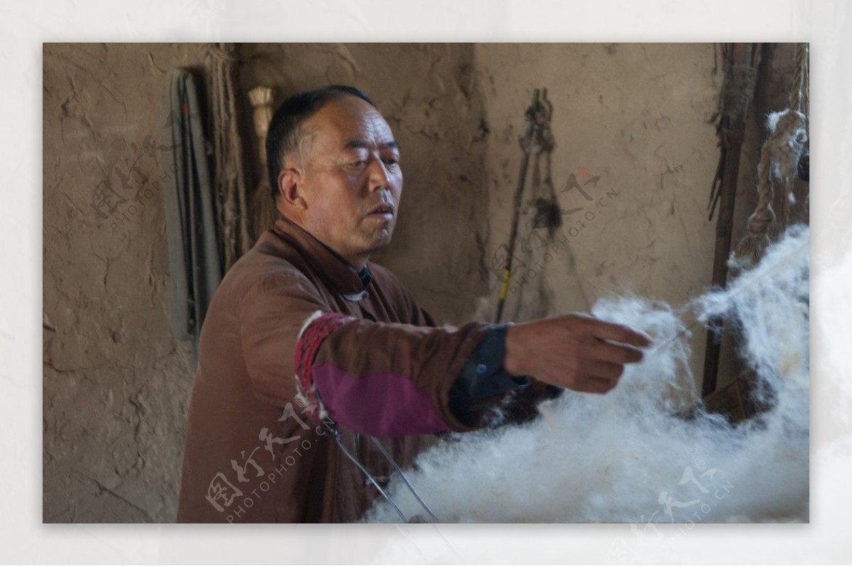 蒙古人弹棉花图片
