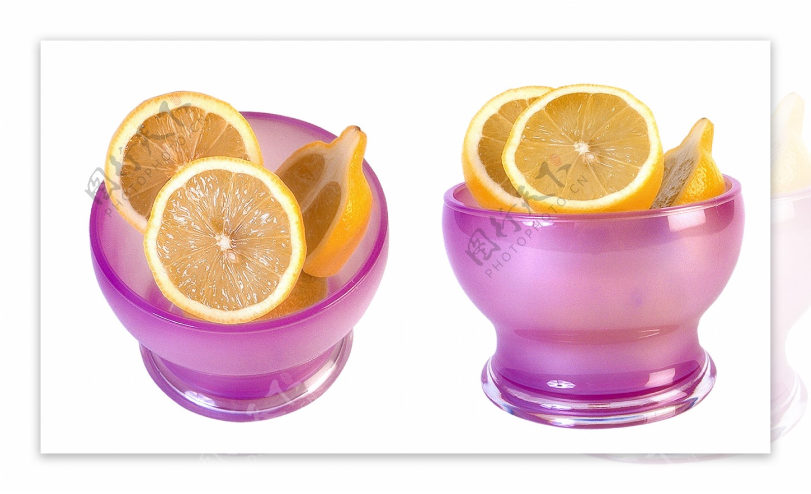 紫色碗里切开的柠檬图片