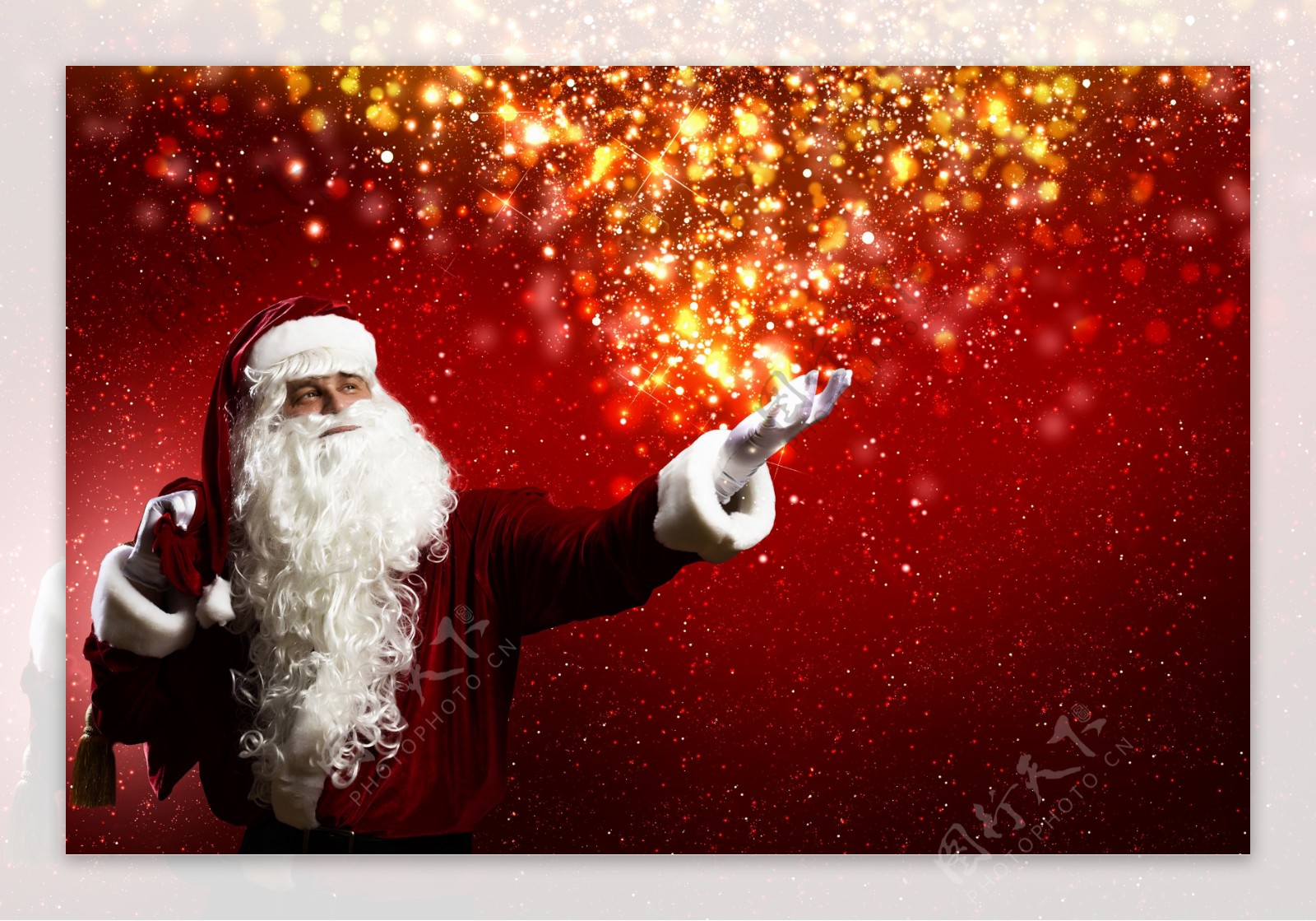 圣诞老人与红色星斑背景图片